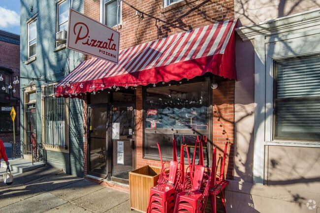 Pizzata Pizzeria is an eatery featuring traditional New York–style pizza in Fitler Square.