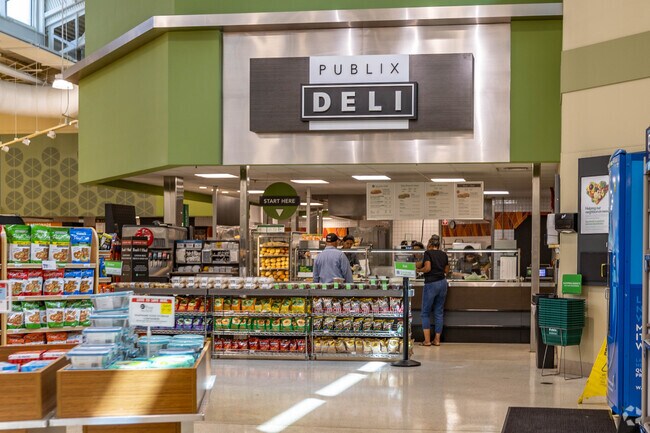 Enjoy shopping at Publix at Pembroke Commons Shopping Center for fresh foods while living in West Boulevard Heights in Pembroke Pines, FL.