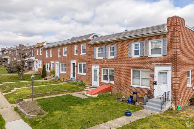 More affordable living options in Prospect Heights include row homes with small front yards.