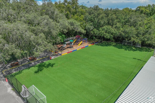 New Springs Schools has a turf playing area behind the school.