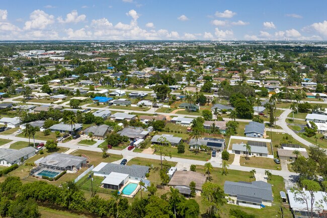 The view from above Metro Parkway neighborhood shows the houses going on and on to the distance.