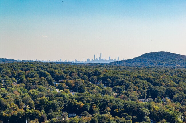 Enjoy the views of the New York City skyline from the hills of Oakland.