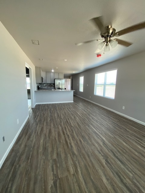 Open floorplan living/dining area with seating at kitchen bar also