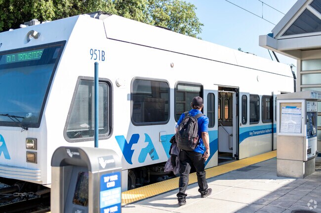 A commuter taking a VTA train in the Bucknall area.