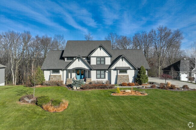 New Traditional homes in Oronoco showcase a well-kept yards and spacious designs.