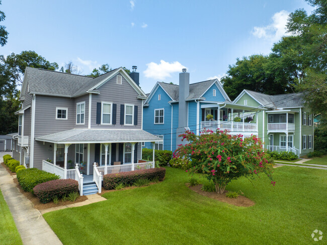 This colorful group of two-story homes complement each other.