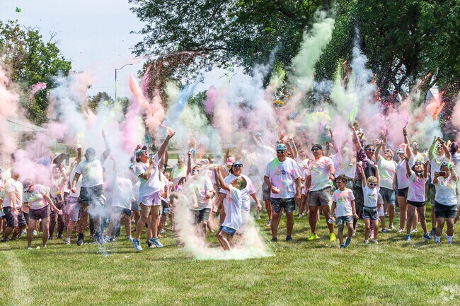 The community celebrates at the Color Run in East Romeoville.