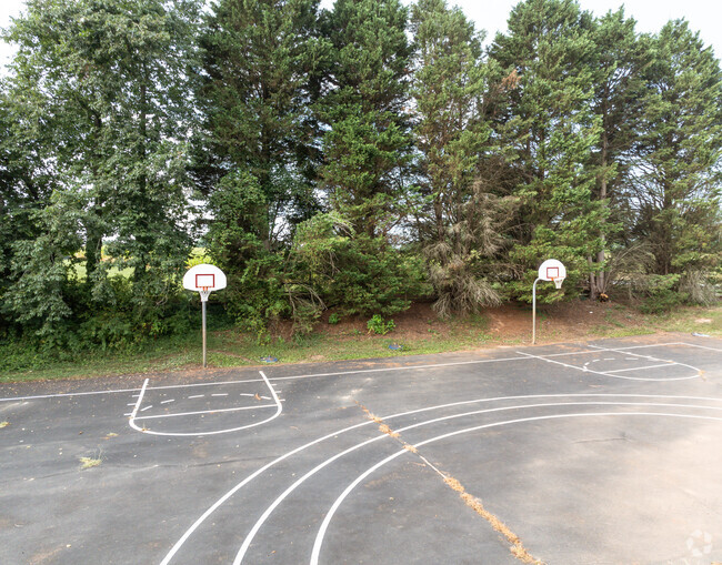 A couple basketball goals on the campus of Shuford Elementary School.