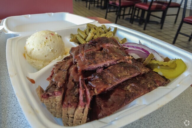 Stop in Off The Bone BBQ for an authentic Texas meal in Forest Hill.