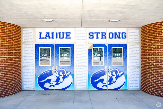 School doors with logo and emblem at Ladue Horton Watkins High School.