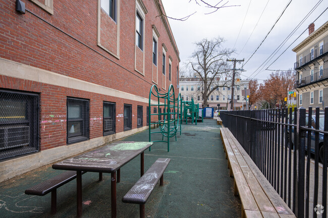 The left side of Tobin Montessori in Mid-Cambridge has a playground.