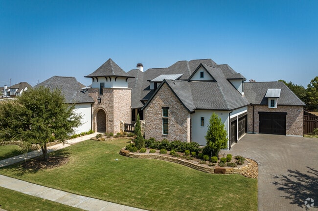 Massive mansions and estates designed in the French provincial style are in Katy.