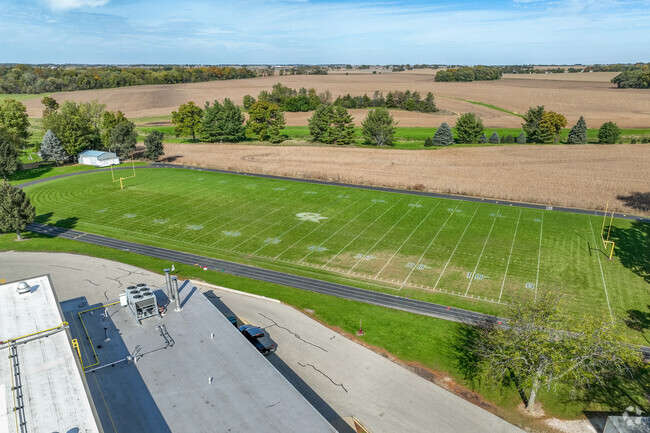 Genoa-Kingston Middle School football field is located near a corn filed with beautiful views.