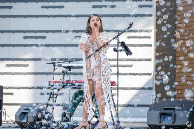 Market in the Park was held in the new Centennial Park West with jamming live music.