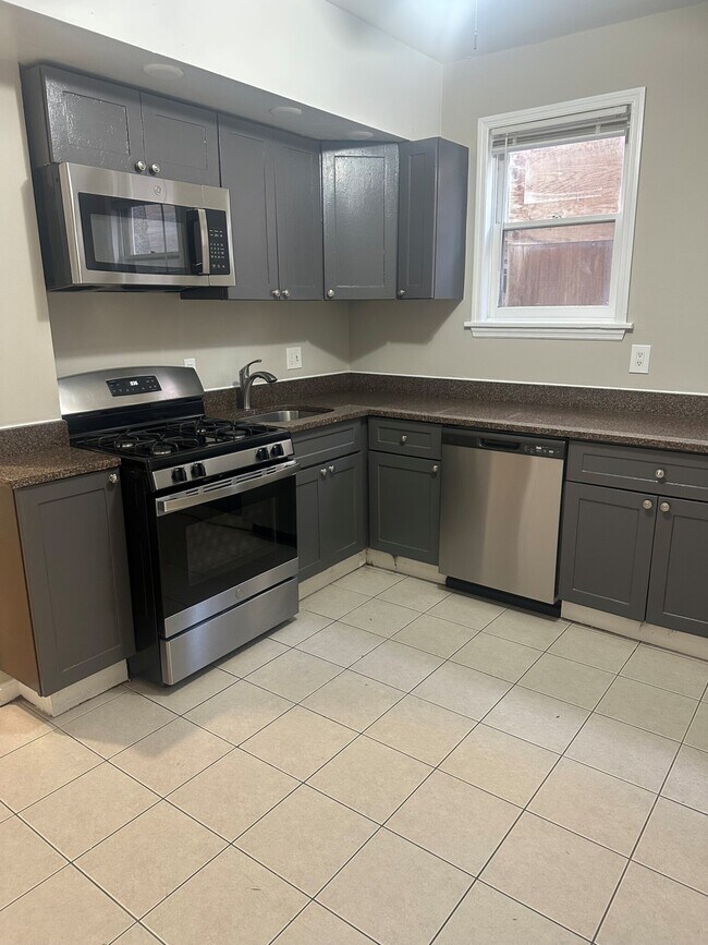 68 Bellevue St Unit 1, Boston, MA 02125