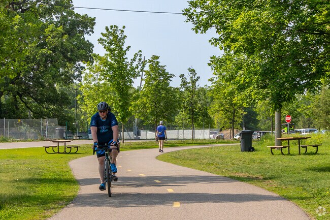 Enjoy miles of shaded bike paths at Mississippi Gateway Regional Park.