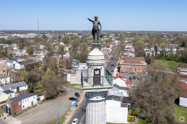 Battle Monument features a bronze statue of George Washington.