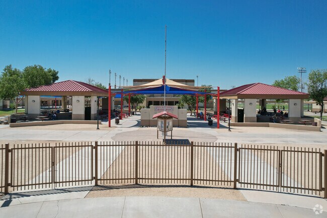 Students gather in a large courtyard with shaded areas at North High School in central Phoenix.