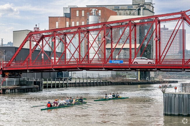 Local rowing teams practice on the Cuyahoga River in West Bank.