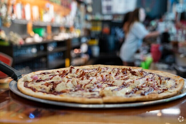 Fresh-baked pizza is on the menu at the Beer Hog in Pelham, located at Campus No. 124.