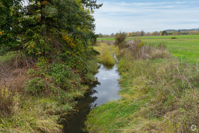 Fifth Plain Creek runs through the eastern part of Orchards-Area.