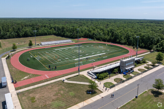 Play football for the Seneca High School Golden Eagles.