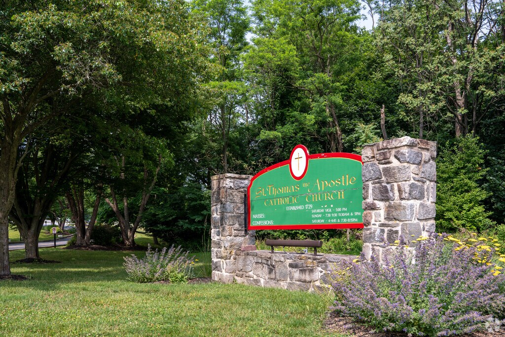 St. Thomas Apostle School is located in a beautiful setting of mature shade trees.