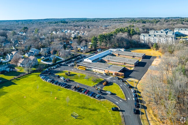 An aerial view of the large John P. Oldham Elementary School campus in Norwood, MA.