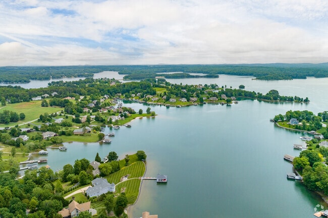 North Shore lakefront properties showcase a mix of traditional and contemporary architecture with private docks and scenic views.
