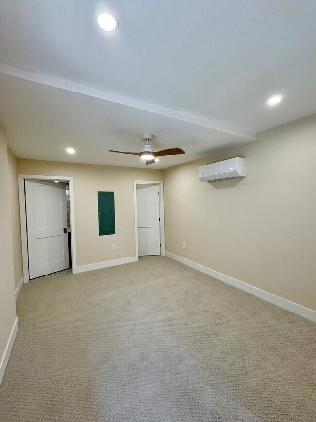 Bedroom with large walk-in closet and master bath
