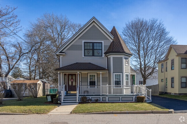 This beautiful Queen Anne style homes is adorned with modern finishes in South Braintree.