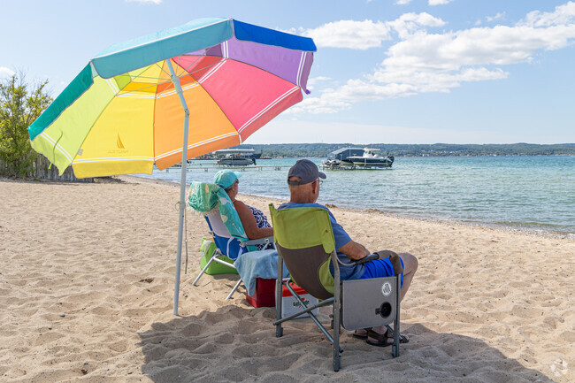 Relax on the beach at Bryant Park in Traverse City, Michigan.