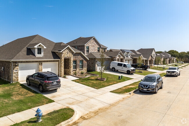 The traditional brick homes in Lake Dallas are on beautiful tree-lined neighborhood streets.