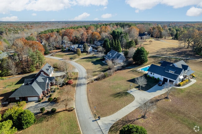 Shady Grove blends Craftsman and Cape Cod homes, with lakefronts $1.5M–$5.5M.