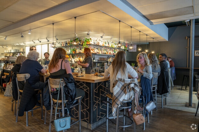 Have a drink at Ricewood's bar near Barton Plateau & Huron River Heights.