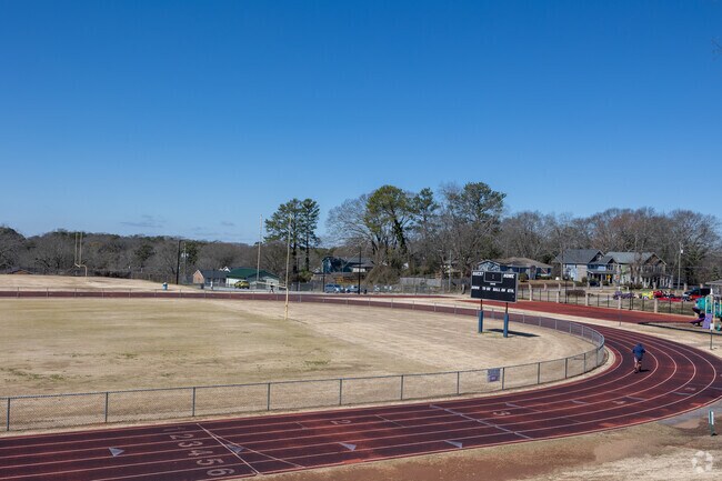 Bill Badgett Stadium, where people come to walk or run, features a public track with stadium seating, plus a playground and basketball court.