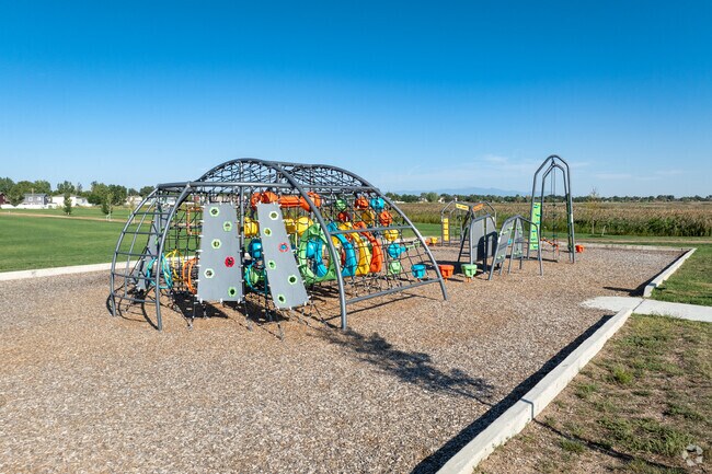 Kids can climb on the playground at Lake Minnequa.
