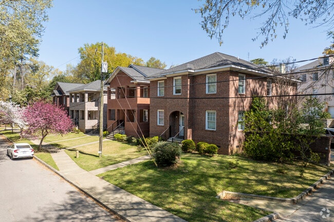 Beautiful homes stand proudly on tree-lined streets near the busy Five Points area.