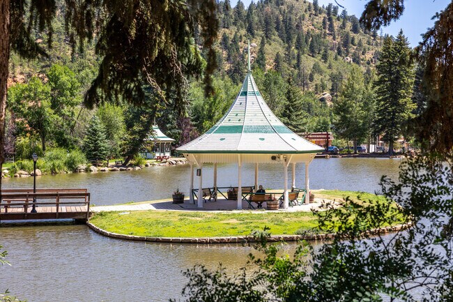 Relax at the beloved gazebo in Lake Park, a favorite gathering spot in Green Mountain Falls.