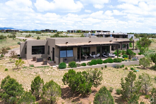 Desert shrubbery surrounds the private  southwest homes of Las Campanas.