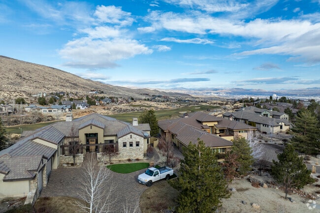 Many homes in Arrowcreek have backyards facing one of the eighteen holes on the golf course.