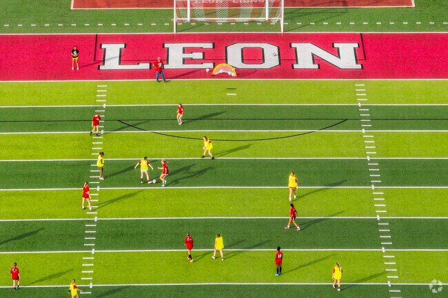 Old Town residents enjoy watching neighborhood kids compete at the local High School, Leon.