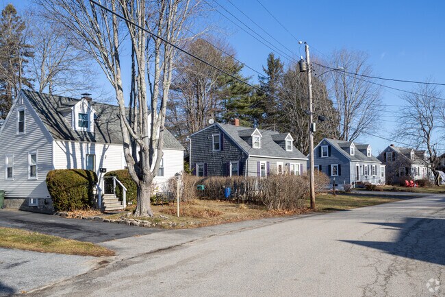 The streets of Sunset Park are lined with charming Cape Cod style homes.