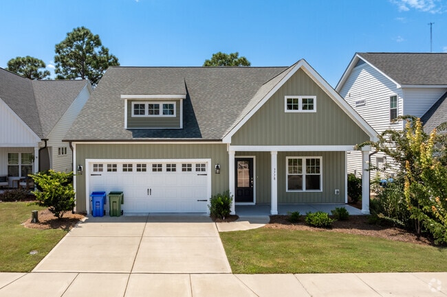 New traditional homes are gradually replacing older ranch-style houses in Longleaf Park.