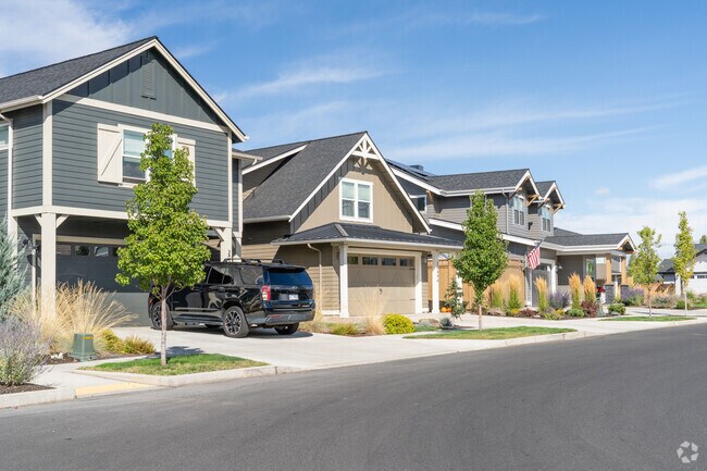Homes in the Old Farm District line the street, each showcasing classic charm and character.