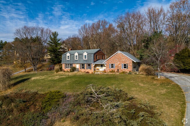 Adorable modified cottage nestled on a quiet Wolfsville hill.