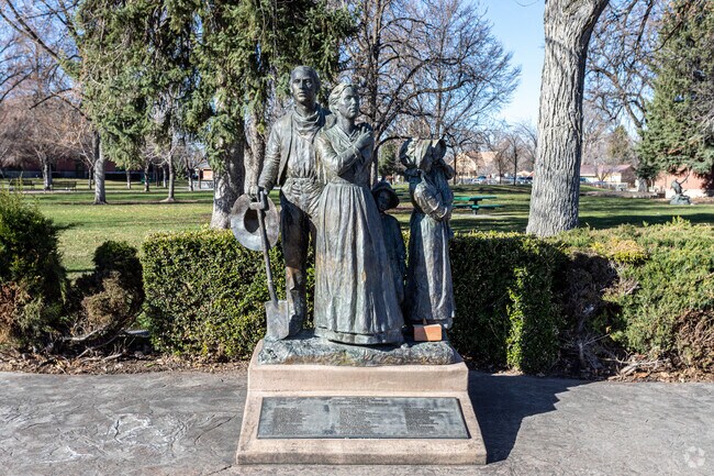 Locally crafted statues in Little Rock Canyon add artistic charm and cultural character to the neighborhood landscape.