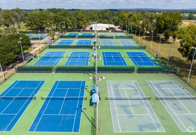 Lagoon Park has a total of sixteen tennis courts with seating in the shade.