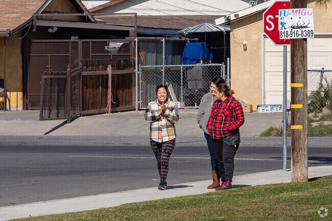 A group of friends enjoys their afternoon walk near Casa Loma County Park.