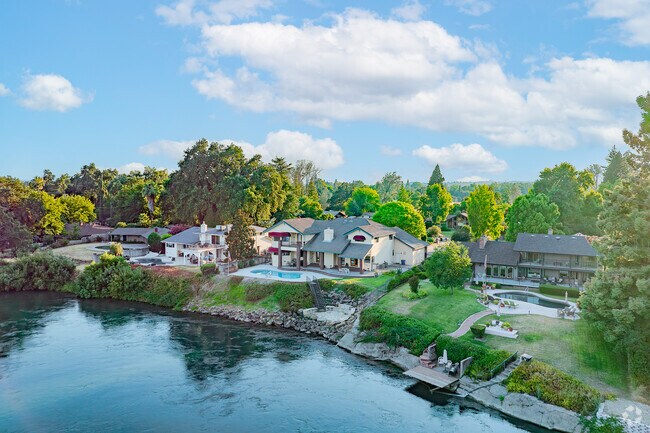 Some families get to enjoy the peace and beauty of the river right from their own backyard.